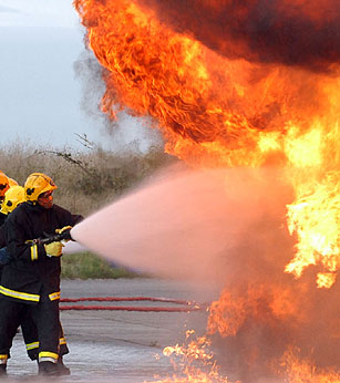 Image of firefighters putting out a fire